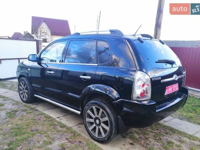Черный Хендай Туксон, объемом двигателя 2 л и пробегом 208 тыс. км за 6950 $, фото 39 на Automoto.ua