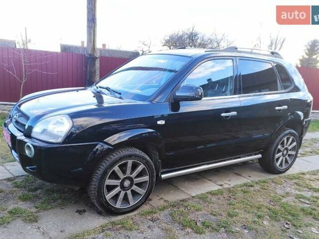 Черный Хендай Туксон, объемом двигателя 2 л и пробегом 208 тыс. км за 6950 $, фото 35 на Automoto.ua