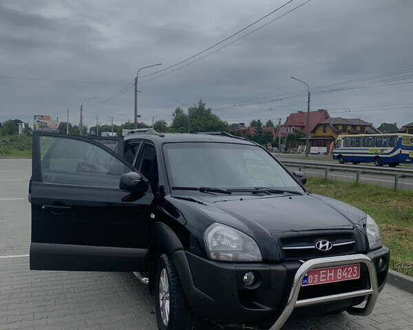 Черный Хендай Туксон, объемом двигателя 2 л и пробегом 270 тыс. км за 6300 $, фото 7 на Automoto.ua