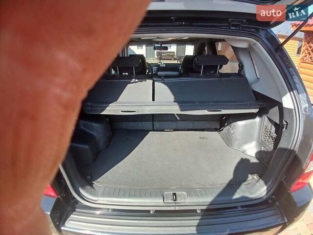 Черный Хендай Туксон, объемом двигателя 2 л и пробегом 315 тыс. км за 7000 $, фото 4 на Automoto.ua