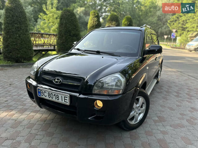 Черный Хендай Туксон, объемом двигателя 2 л и пробегом 210 тыс. км за 6600 $, фото 21 на Automoto.ua