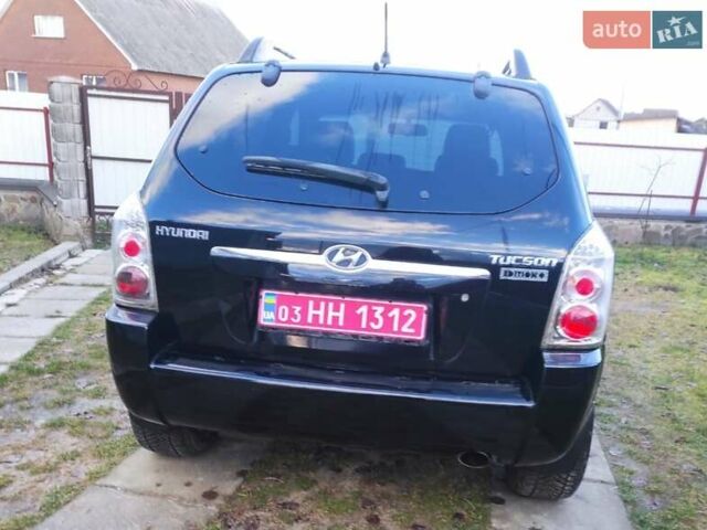 Черный Хендай Туксон, объемом двигателя 2 л и пробегом 208 тыс. км за 6950 $, фото 46 на Automoto.ua