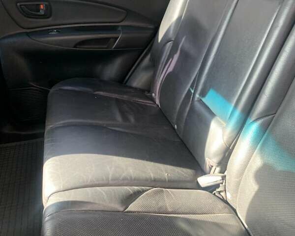 Хендай Туксон 2005 у Сумах на Automoto.ua Чорний Хендай Туксон, об'ємом двигуна 1.99 л та пробігом 294 тис. км за 4500 $, фото 4 на Automoto.ua