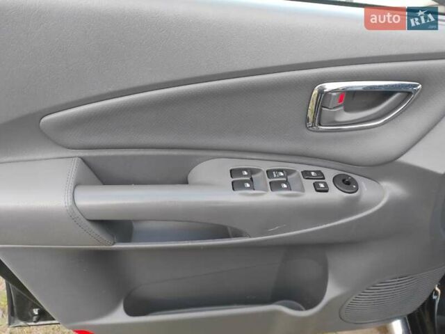 Черный Хендай Туксон, объемом двигателя 2 л и пробегом 208 тыс. км за 6950 $, фото 17 на Automoto.ua