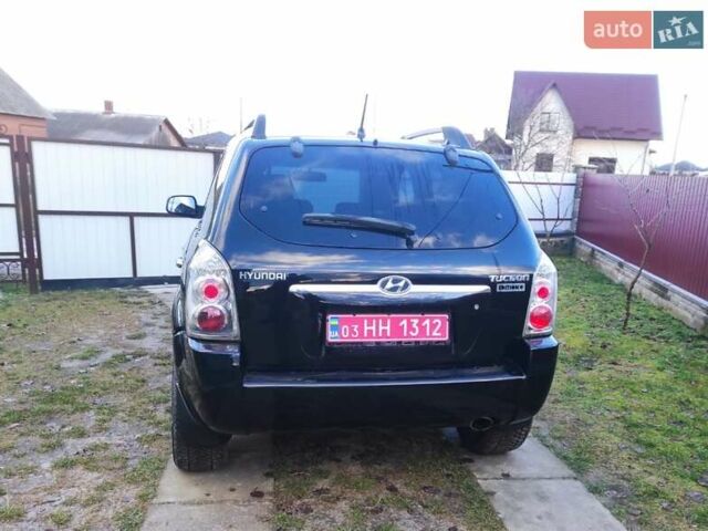 Черный Хендай Туксон, объемом двигателя 2 л и пробегом 208 тыс. км за 6950 $, фото 44 на Automoto.ua