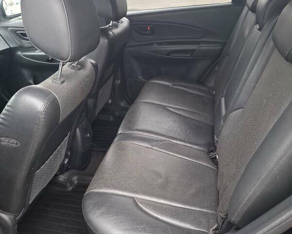 Черный Хендай Туксон, объемом двигателя 2 л и пробегом 170 тыс. км за 6999 $, фото 11 на Automoto.ua