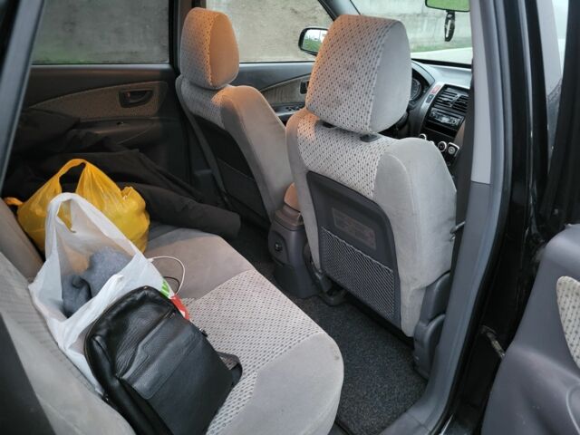 Черный Хендай Туксон, объемом двигателя 2 л и пробегом 180 тыс. км за 4500 $, фото 12 на Automoto.ua