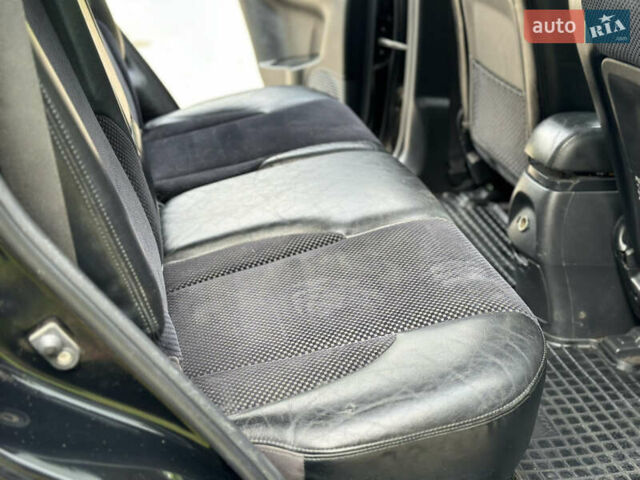 Черный Хендай Туксон, объемом двигателя 2 л и пробегом 210 тыс. км за 6600 $, фото 60 на Automoto.ua