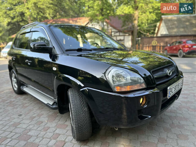 Черный Хендай Туксон, объемом двигателя 2 л и пробегом 210 тыс. км за 6600 $, фото 26 на Automoto.ua