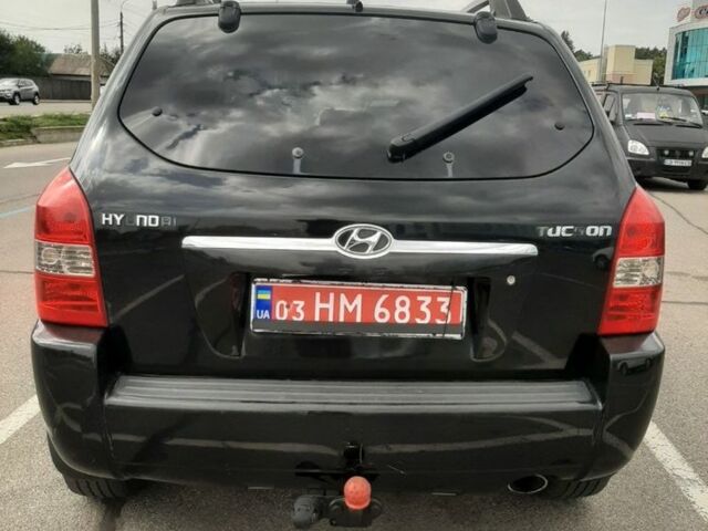 Чорний Хендай Туксон, об'ємом двигуна 2 л та пробігом 246 тис. км за 7850 $, фото 4 на Automoto.ua