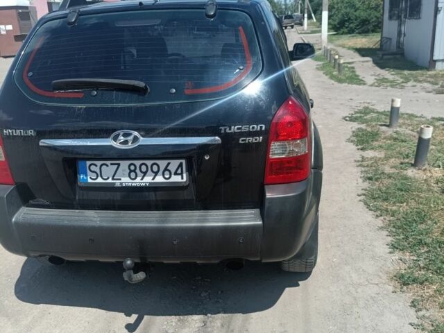 Чорний Хендай Туксон, об'ємом двигуна 2 л та пробігом 280 тис. км за 4127 $, фото 6 на Automoto.ua
