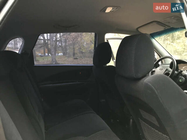 Черный Хендай Туксон, объемом двигателя 2 л и пробегом 261 тыс. км за 6500 $, фото 22 на Automoto.ua