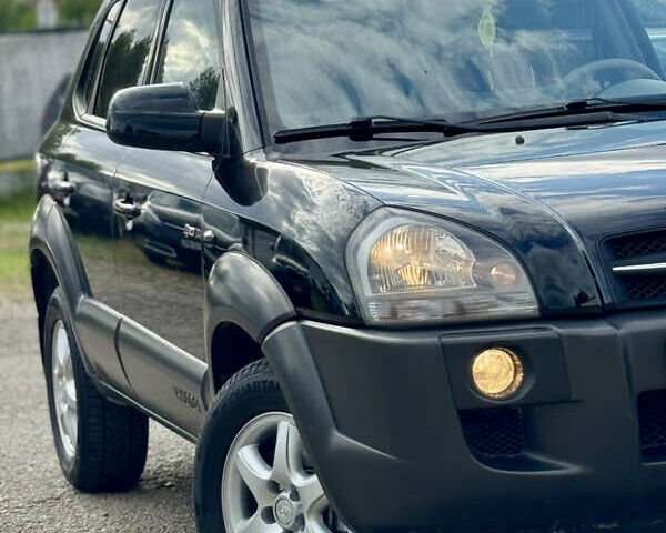 Чорний Хендай Туксон, об'ємом двигуна 2 л та пробігом 225 тис. км за 8500 $, фото 10 на Automoto.ua