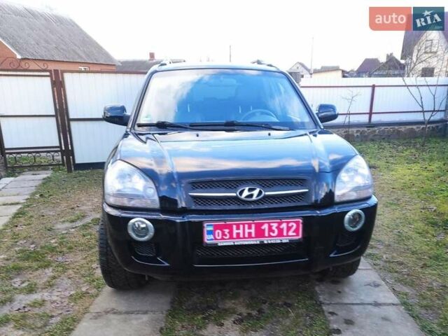 Черный Хендай Туксон, объемом двигателя 2 л и пробегом 208 тыс. км за 6950 $, фото 48 на Automoto.ua