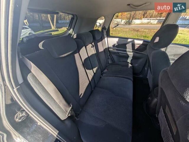 Черный Хендай Туксон, объемом двигателя 1.98 л и пробегом 226 тыс. км за 6500 $, фото 12 на Automoto.ua