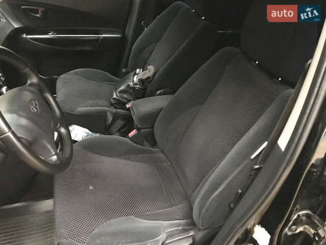 Черный Хендай Туксон, объемом двигателя 2 л и пробегом 261 тыс. км за 6500 $, фото 20 на Automoto.ua