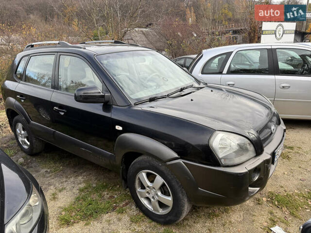 Черный Хендай Туксон, объемом двигателя 2 л и пробегом 211 тыс. км за 4444 $, фото 3 на Automoto.ua