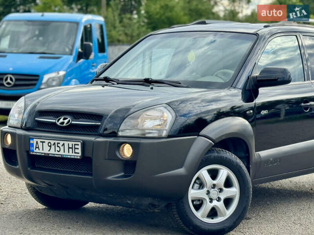 Чорний Хендай Туксон, об'ємом двигуна 2 л та пробігом 225 тис. км за 8500 $, фото 2 на Automoto.ua
