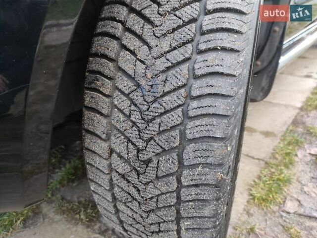 Черный Хендай Туксон, объемом двигателя 2 л и пробегом 208 тыс. км за 6950 $, фото 57 на Automoto.ua