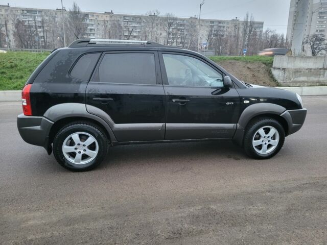 Черный Хендай Туксон, объемом двигателя 2 л и пробегом 180 тыс. км за 4500 $, фото 15 на Automoto.ua