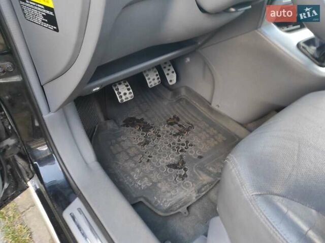 Черный Хендай Туксон, объемом двигателя 2 л и пробегом 208 тыс. км за 6950 $, фото 16 на Automoto.ua