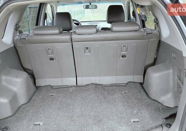 Чорний Хендай Туксон, об'ємом двигуна 1.98 л та пробігом 213 тис. км за 7500 $, фото 10 на Automoto.ua