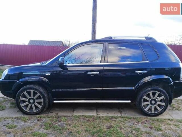 Черный Хендай Туксон, объемом двигателя 2 л и пробегом 208 тыс. км за 6950 $, фото 33 на Automoto.ua