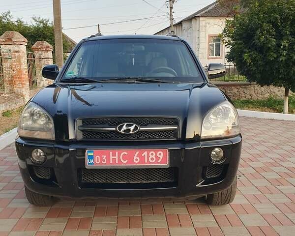 Чорний Хендай Туксон, об'ємом двигуна 1.98 л та пробігом 137 тис. км за 7599 $, фото 7 на Automoto.ua