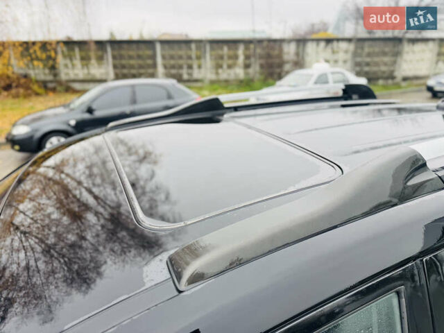 Черный Хендай Туксон, объемом двигателя 1.98 л и пробегом 252 тыс. км за 7300 $, фото 13 на Automoto.ua