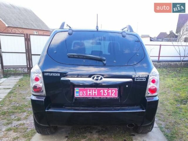 Черный Хендай Туксон, объемом двигателя 2 л и пробегом 208 тыс. км за 6950 $, фото 45 на Automoto.ua