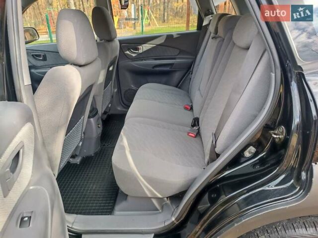 Черный Хендай Туксон, объемом двигателя 1.98 л и пробегом 192 тыс. км за 6900 $, фото 10 на Automoto.ua