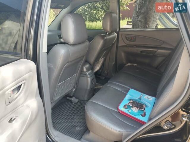 Чорний Хендай Туксон, об'ємом двигуна 1.98 л та пробігом 179 тис. км за 8000 $, фото 2 на Automoto.ua