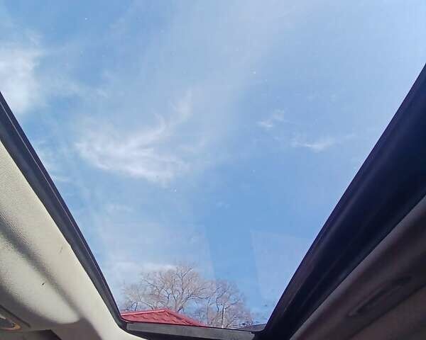 Черный Хендай Туксон, объемом двигателя 2 л и пробегом 315 тыс. км за 7000 $, фото 2 на Automoto.ua