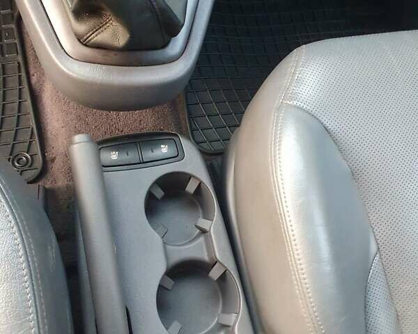 Чорний Хендай Туксон, об'ємом двигуна 1.98 л та пробігом 137 тис. км за 7599 $, фото 20 на Automoto.ua
