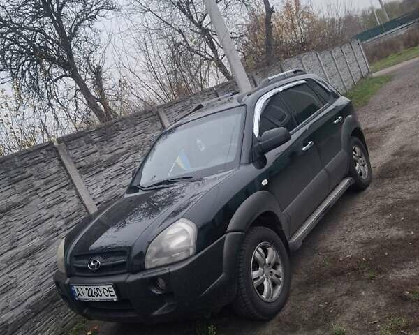 Черный Хендай Туксон, объемом двигателя 2 л и пробегом 224 тыс. км за 6800 $, фото 11 на Automoto.ua