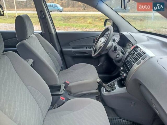 Черный Хендай Туксон, объемом двигателя 1.98 л и пробегом 192 тыс. км за 6900 $, фото 19 на Automoto.ua