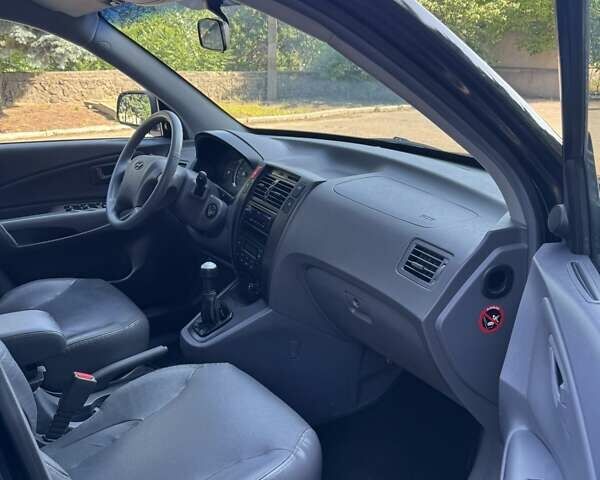 Хендай Туксон 2005 у Вознесенске на Automoto.ua Чорний Хендай Туксон, об'ємом двигуна 1.98 л та пробігом 144 тис. км за 7500 $, фото 2 на Automoto.ua