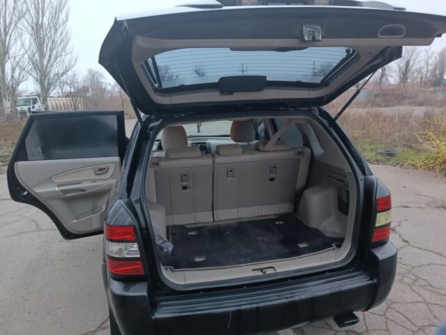 Черный Хендай Туксон, объемом двигателя 2 л и пробегом 293 тыс. км за 4300 $, фото 6 на Automoto.ua