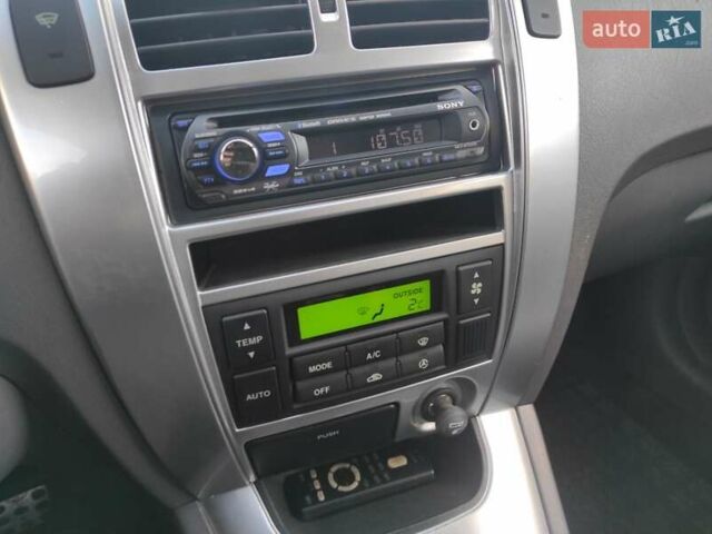 Черный Хендай Туксон, объемом двигателя 2 л и пробегом 208 тыс. км за 6950 $, фото 11 на Automoto.ua