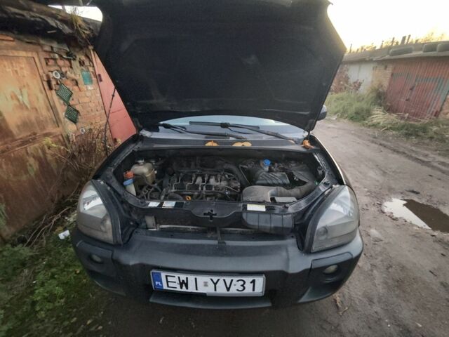 Черный Хендай Туксон, объемом двигателя 2 л и пробегом 370 тыс. км за 3300 $, фото 3 на Automoto.ua