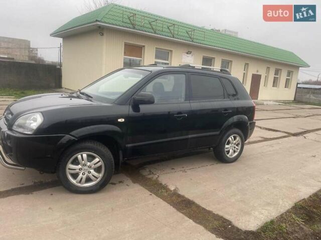 Черный Хендай Туксон, объемом двигателя 2 л и пробегом 190 тыс. км за 7500 $, фото 23 на Automoto.ua