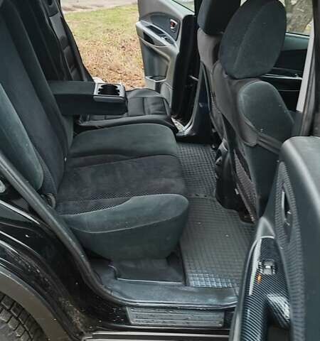 Черный Хендай Туксон, объемом двигателя 2 л и пробегом 284 тыс. км за 4700 $, фото 14 на Automoto.ua