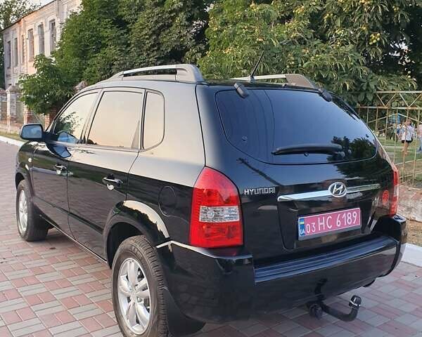 Чорний Хендай Туксон, об'ємом двигуна 1.98 л та пробігом 137 тис. км за 7599 $, фото 12 на Automoto.ua