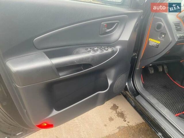 Черный Хендай Туксон, объемом двигателя 2 л и пробегом 190 тыс. км за 7500 $, фото 14 на Automoto.ua