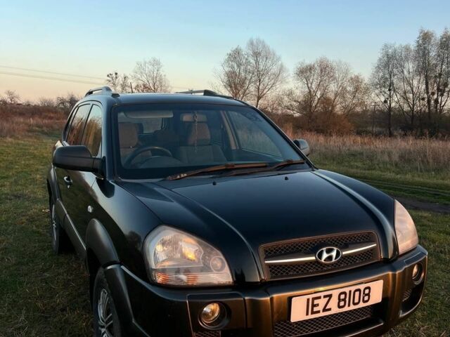 Черный Хендай Туксон, объемом двигателя 2 л и пробегом 137 тыс. км за 4300 $, фото 1 на Automoto.ua