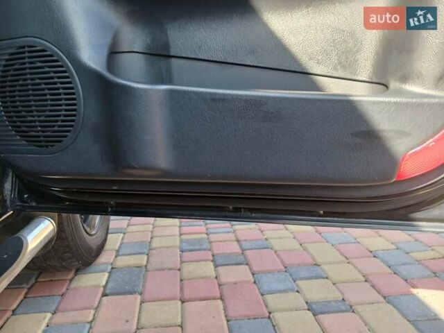 Черный Хендай Туксон, объемом двигателя 2 л и пробегом 315 тыс. км за 7000 $, фото 8 на Automoto.ua