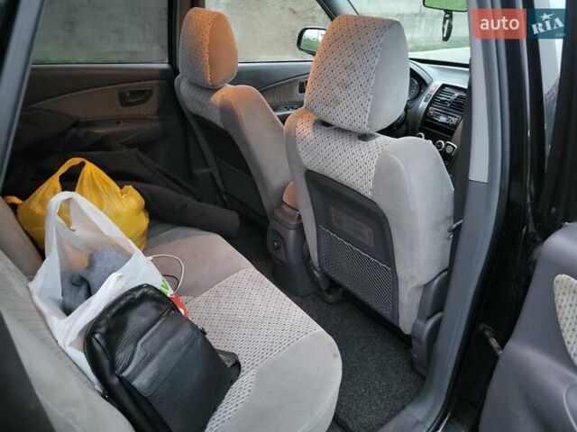 Чорний Хендай Туксон, об'ємом двигуна 2 л та пробігом 180 тис. км за 4500 $, фото 10 на Automoto.ua