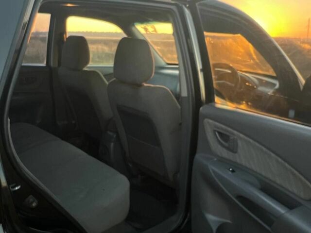 Черный Хендай Туксон, объемом двигателя 2 л и пробегом 137 тыс. км за 4300 $, фото 4 на Automoto.ua