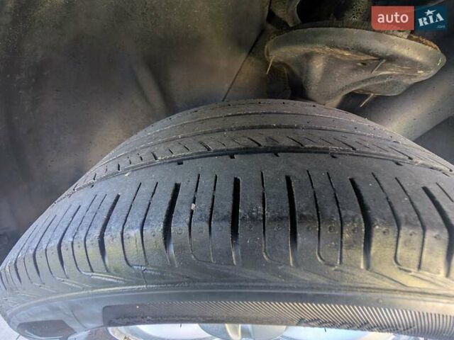 Черный Хендай Туксон, объемом двигателя 1.98 л и пробегом 226 тыс. км за 6500 $, фото 15 на Automoto.ua