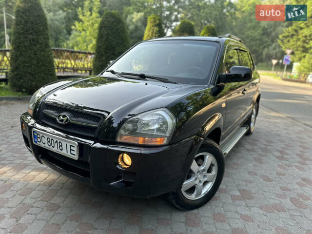Черный Хендай Туксон, объемом двигателя 2 л и пробегом 210 тыс. км за 6600 $, фото 24 на Automoto.ua